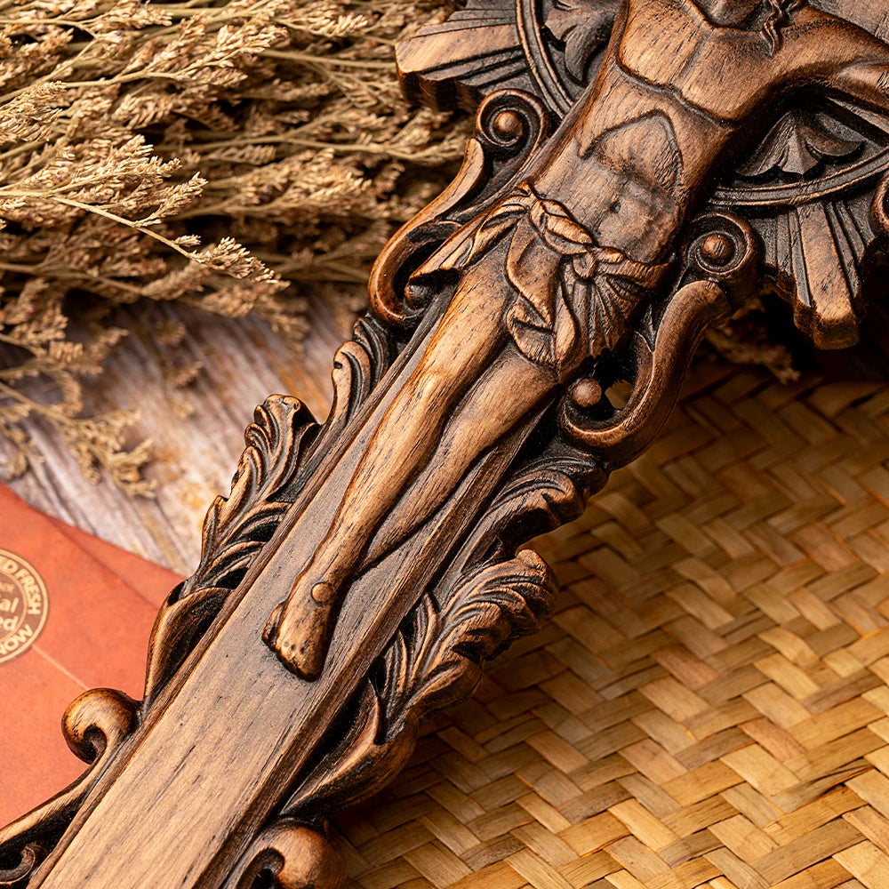 Vintage wooden crucifix featuring an intricately detailed Jesus figure, crafted from solid wood.