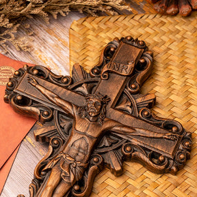 Vintage wooden crucifix featuring an intricately detailed Jesus figure, crafted from solid wood.