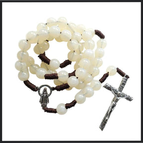 This beautifully crafted acrylic beige bead rosary, featuring a detailed Virgin Mary medal and elegant crucifix pendant.