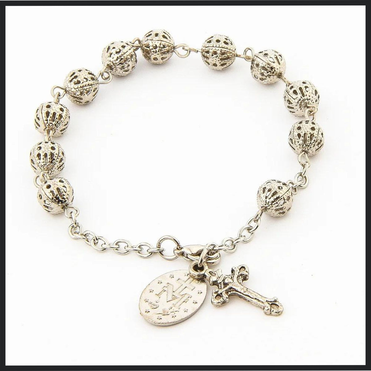 Silver - plated rosary bracelet with hollow beads, a cross pendant, and an Our Lady of Guadalupe medal.