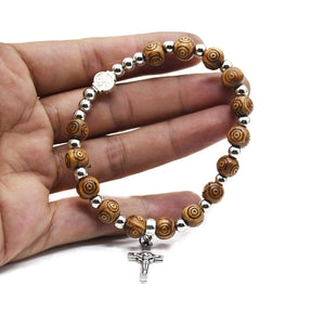 Vintage rosary bracelet with 8mm wood beads and a Jesus Christ crucifix cross pendant.