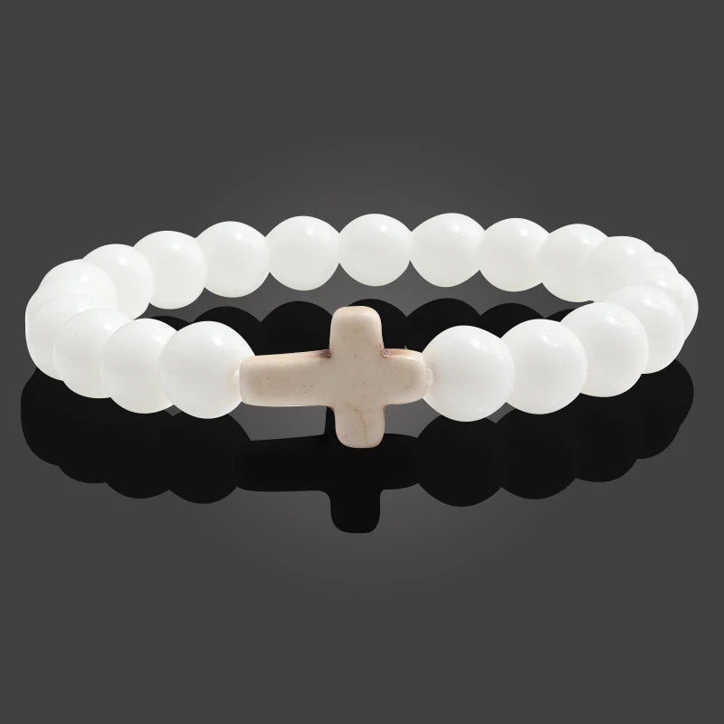 Heavenly white natural stone beaded bracelet featuring a cross charm, ideal for religious and everyday wear.