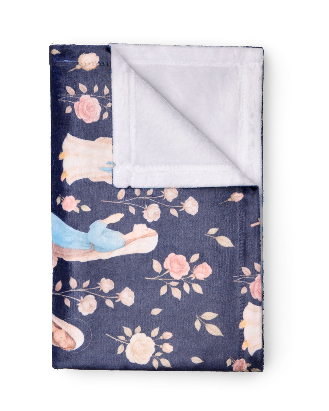 A folded blanket with a navy blue background featuring a floral print and illustrations of feet in sandals, with a soft white sherpa lining visible on the reverse side.