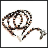 Rustic Wooden Rosary with Black Beads and a Traditional Crucifix Pendant