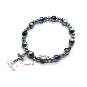 Stylish blue and silver bead bracelet featuring a small alloy cross pendant, perfect for spiritual expression and daily wear.