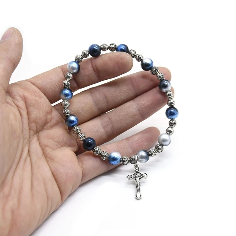 Stylish blue and silver bead bracelet featuring a small alloy cross pendant, perfect for spiritual expression and daily wear.