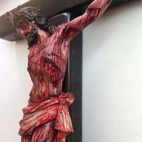 Profound image of Jesus on the cross, crafted from high-quality resin, perfect for wall hanging in home or church decor.