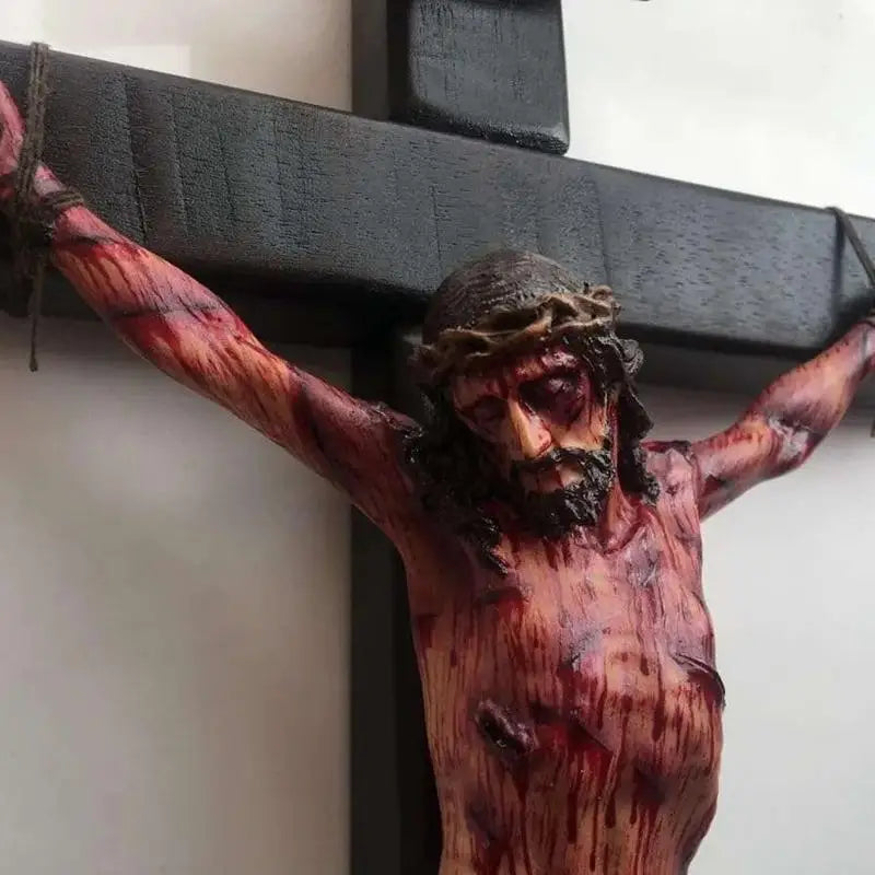 Profound image of Jesus on the cross, crafted from high-quality resin, perfect for wall hanging in home or church decor.