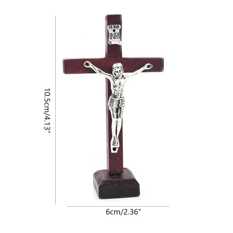 Wine red wooden crucifix with silver-tone Jesus figure, standing on a stable base.